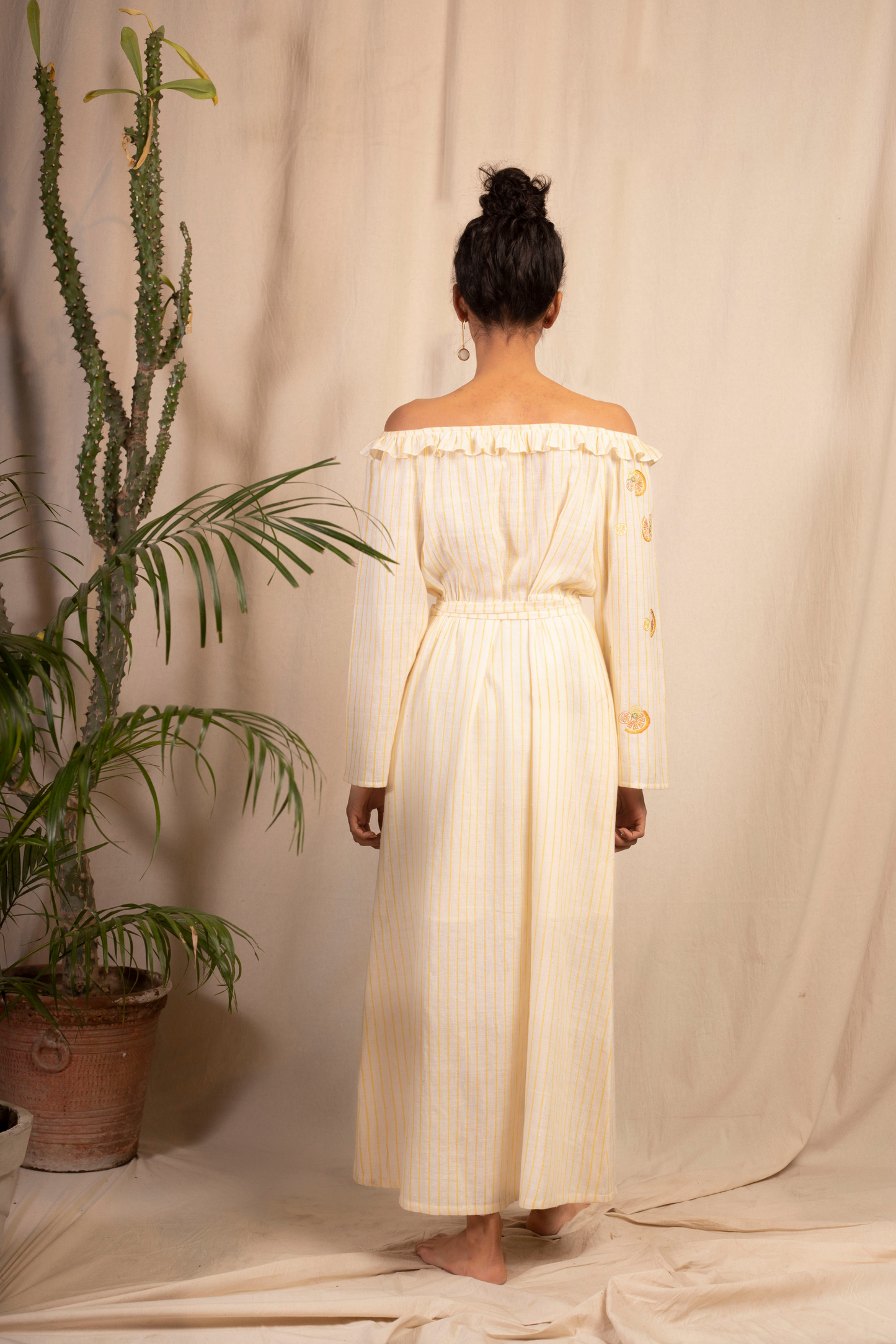 Sui | DOLCE VITA embroidered handwoven organic cotton off-shoulder maxi dress with a cinched waist from Granita Summer Collection 2019