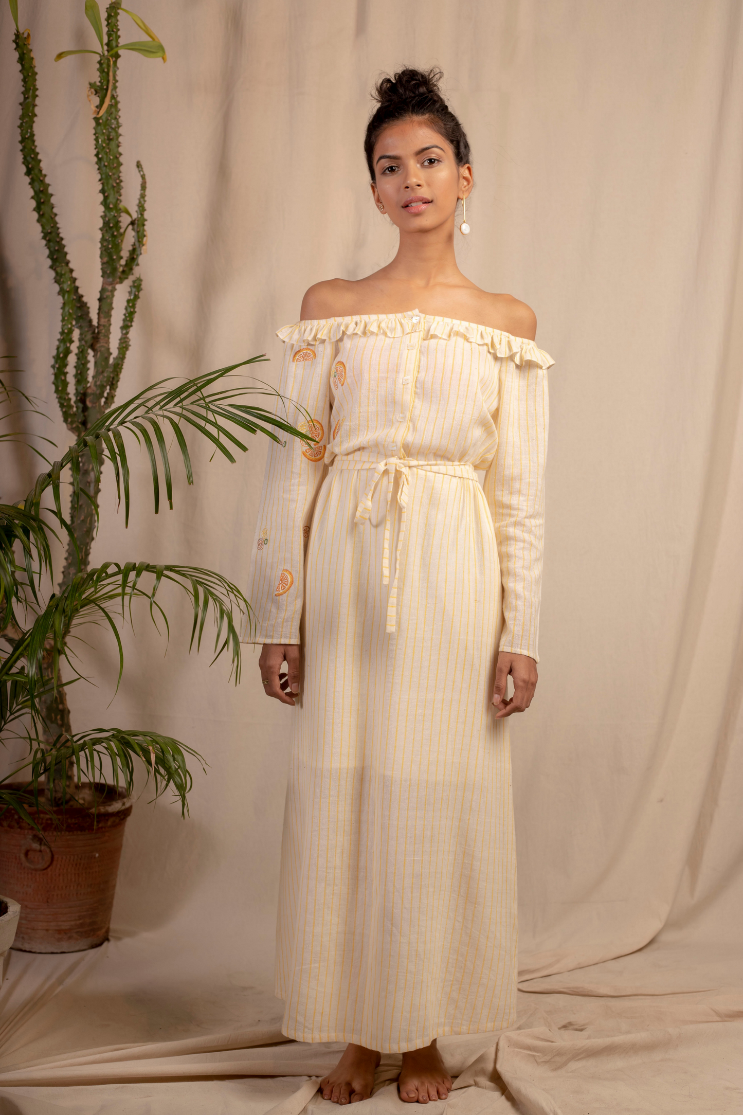 Sui | DOLCE VITA embroidered handwoven organic cotton off-shoulder maxi dress with a cinched waist from Granita Summer Collection 2019
