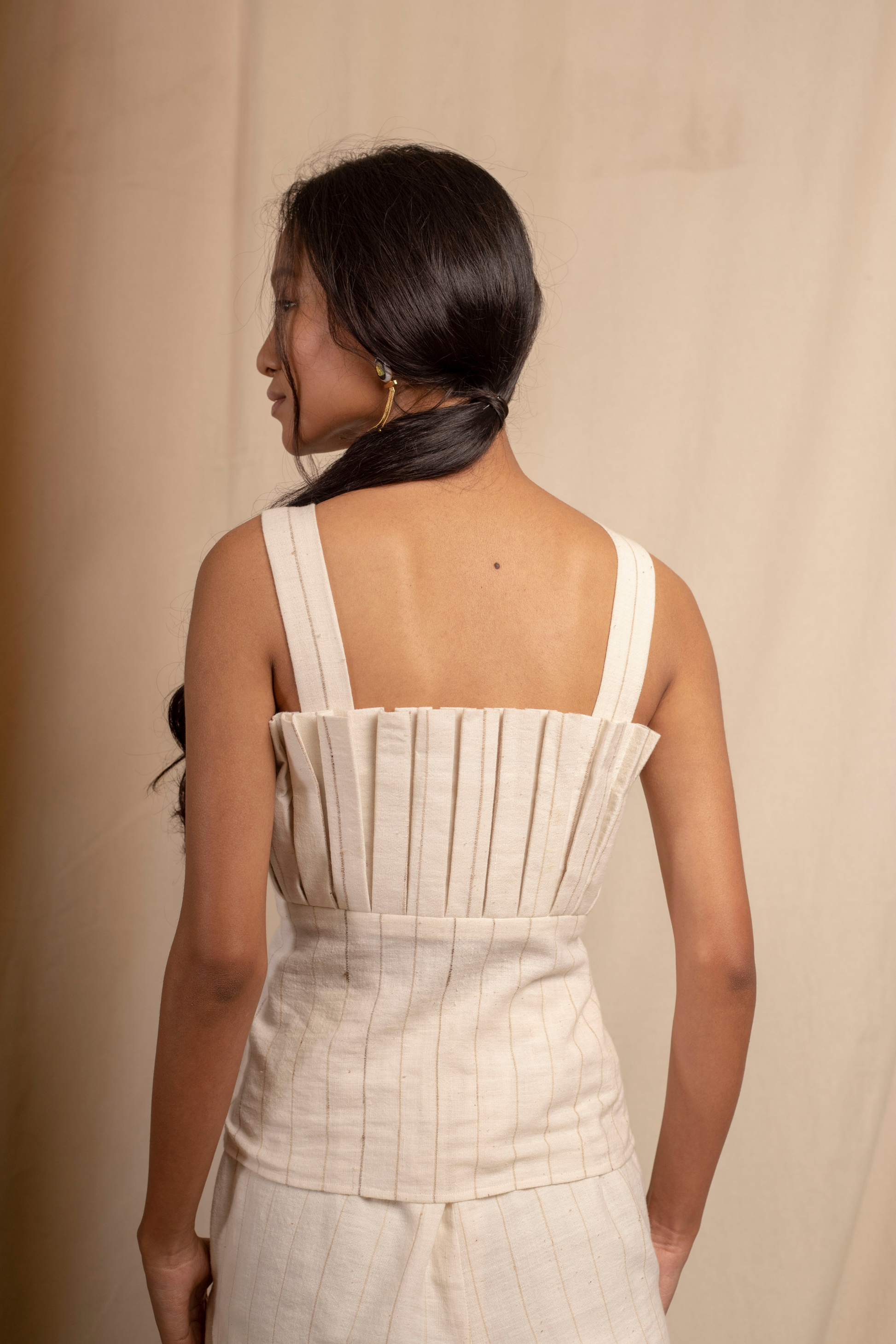 Sui | MARIA hand-embroidered, naturally dyed handwoven organic cotton pleated strappy top from Granita Summer Collection 2019