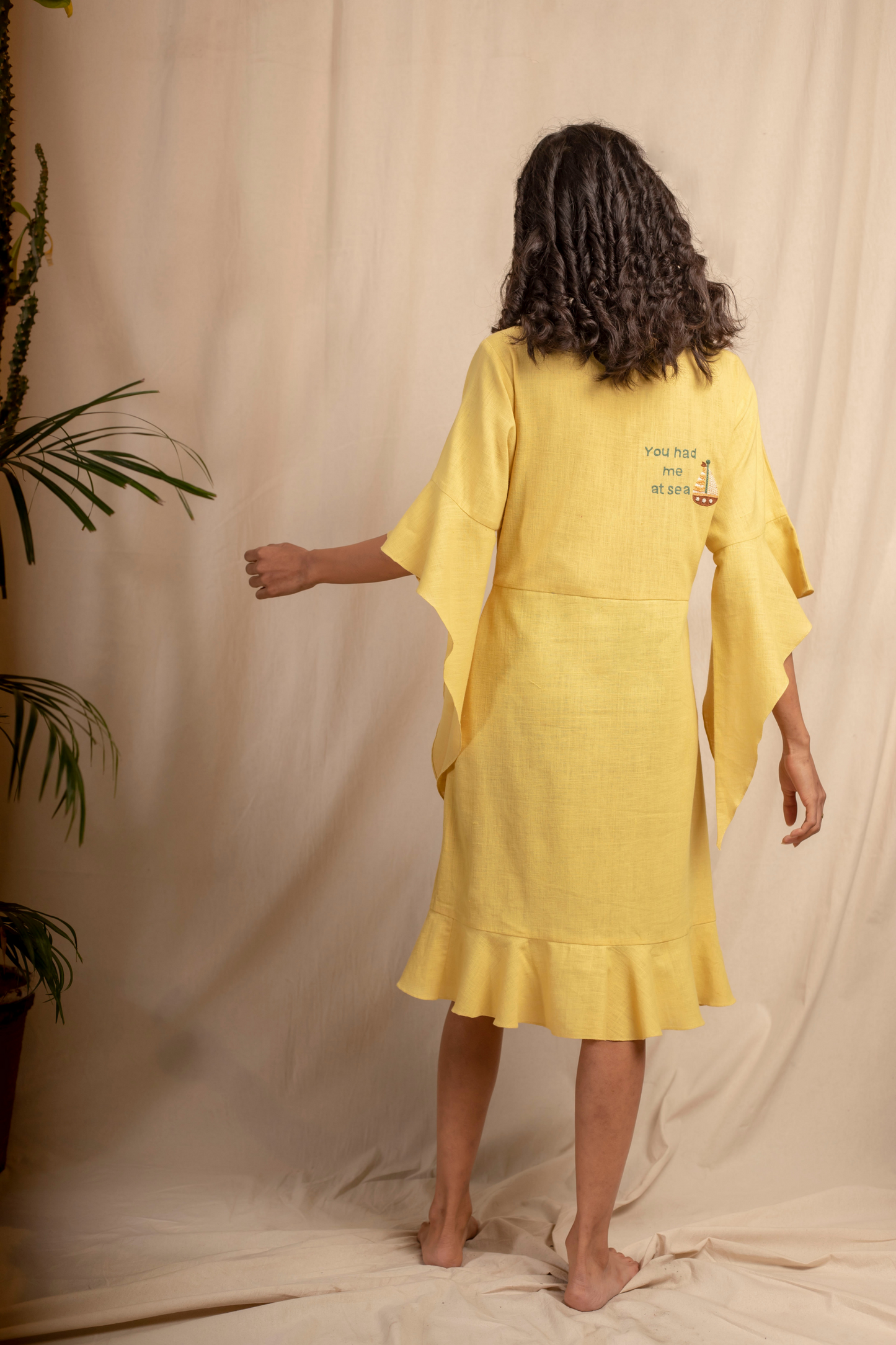 Sui | SERENO hand-embroidered, herbal-dyed handwoven organic cotton belted dress with ruffle details from Granita Summer Collection 2019
