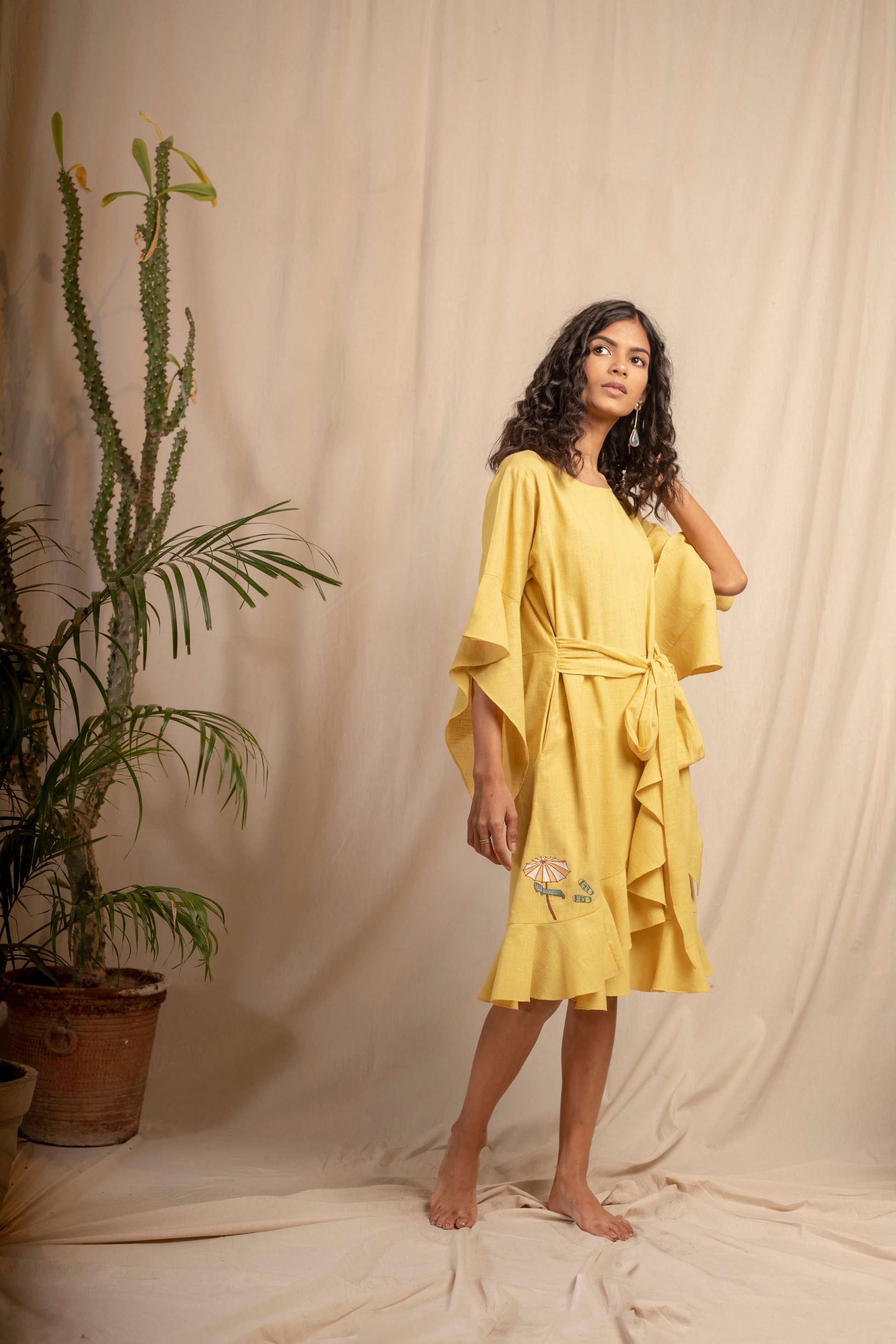 Sui | SERENO hand-embroidered, herbal-dyed handwoven organic cotton belted dress with ruffle details from Granita Summer Collection 2019