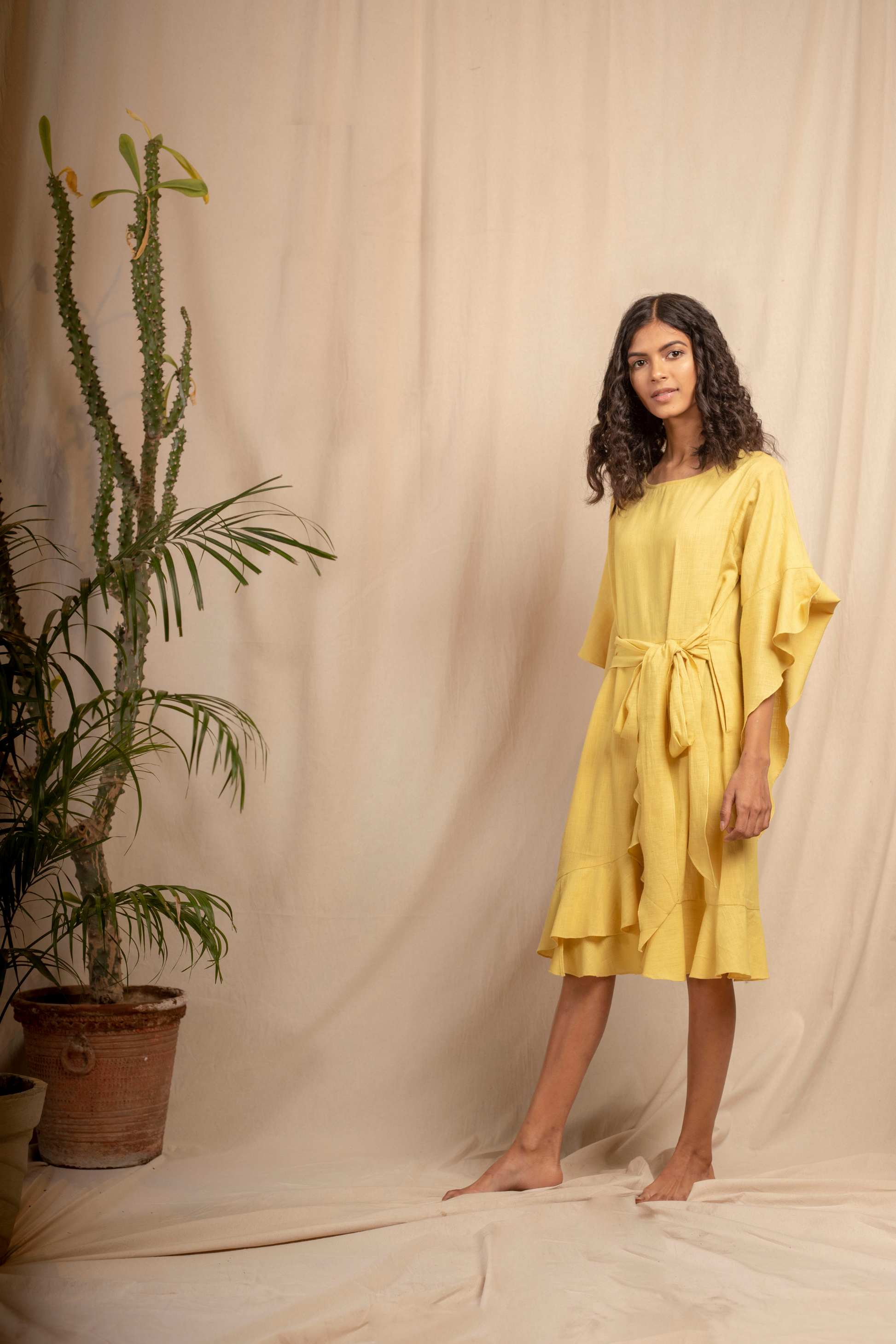 Sui | SERENO hand-embroidered, herbal-dyed handwoven organic cotton belted dress with ruffle details from Granita Summer Collection 2019